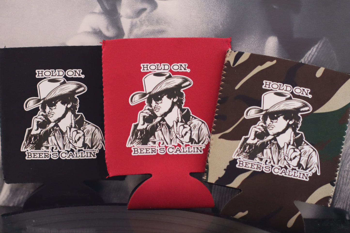 HOLD ON, BEER'S CALLIN' KOOZIE [+ STICKER]