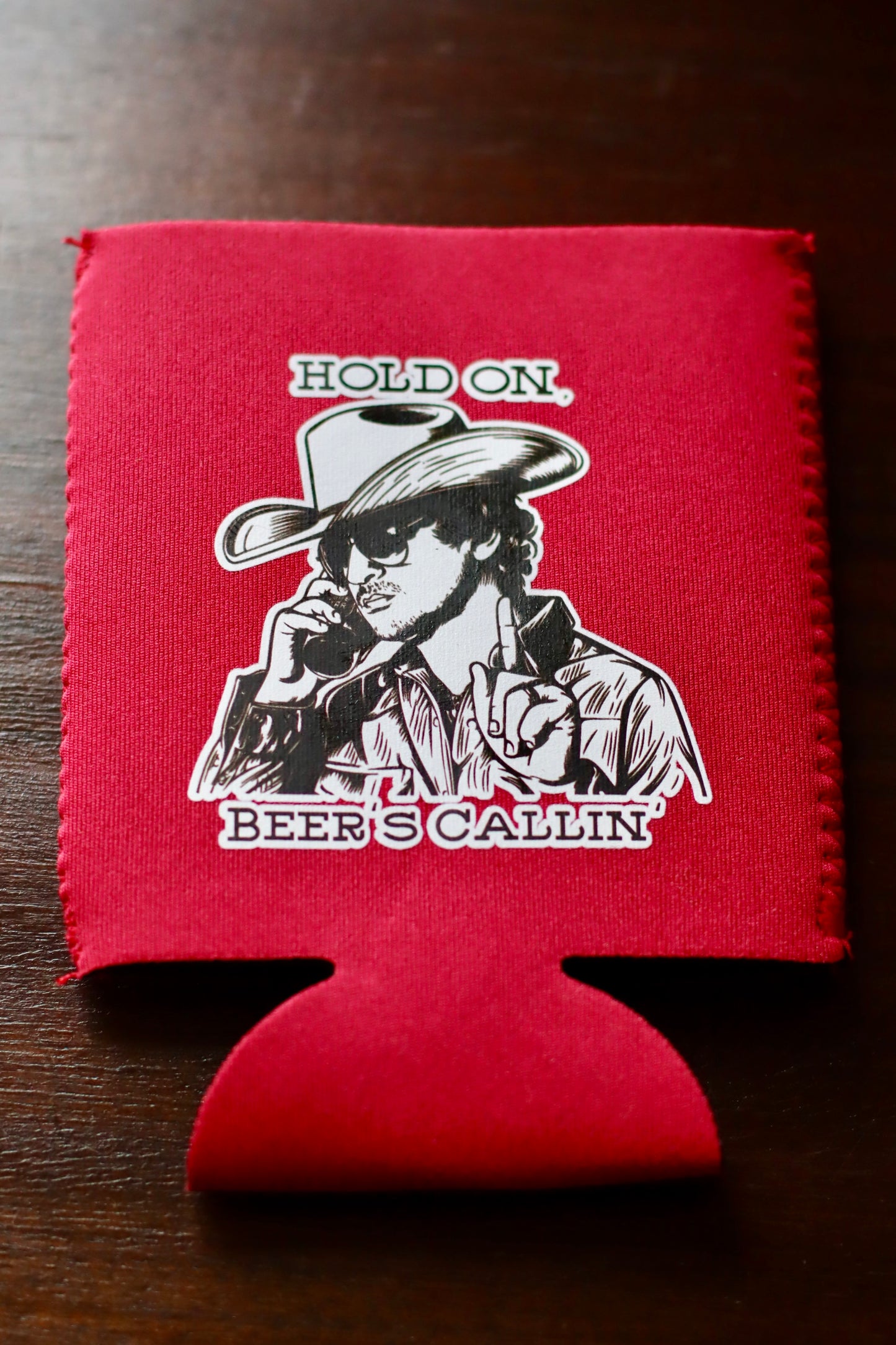 HOLD ON, BEER'S CALLIN' KOOZIE [+ STICKER]