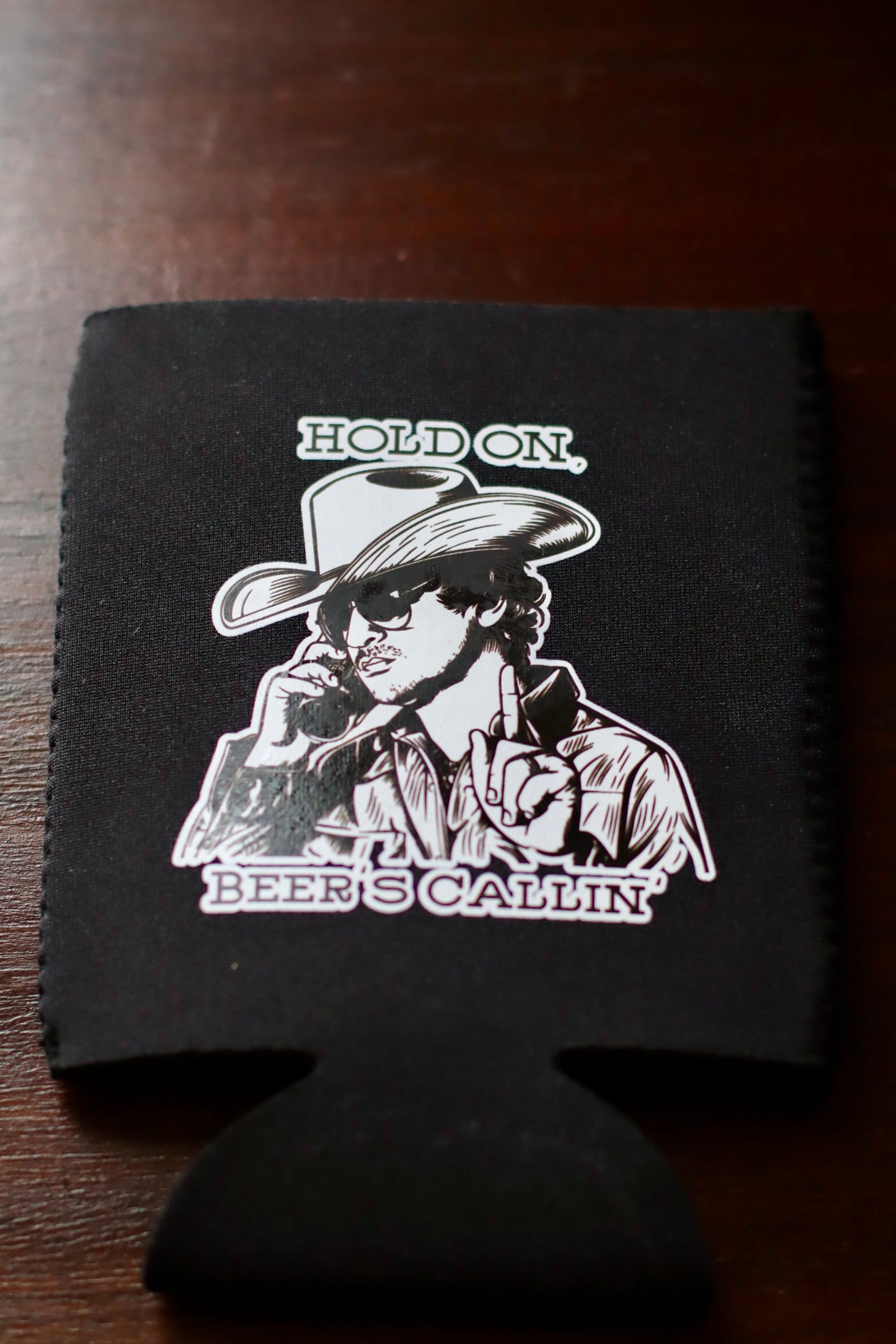 HOLD ON, BEER'S CALLIN' KOOZIE [+ STICKER]