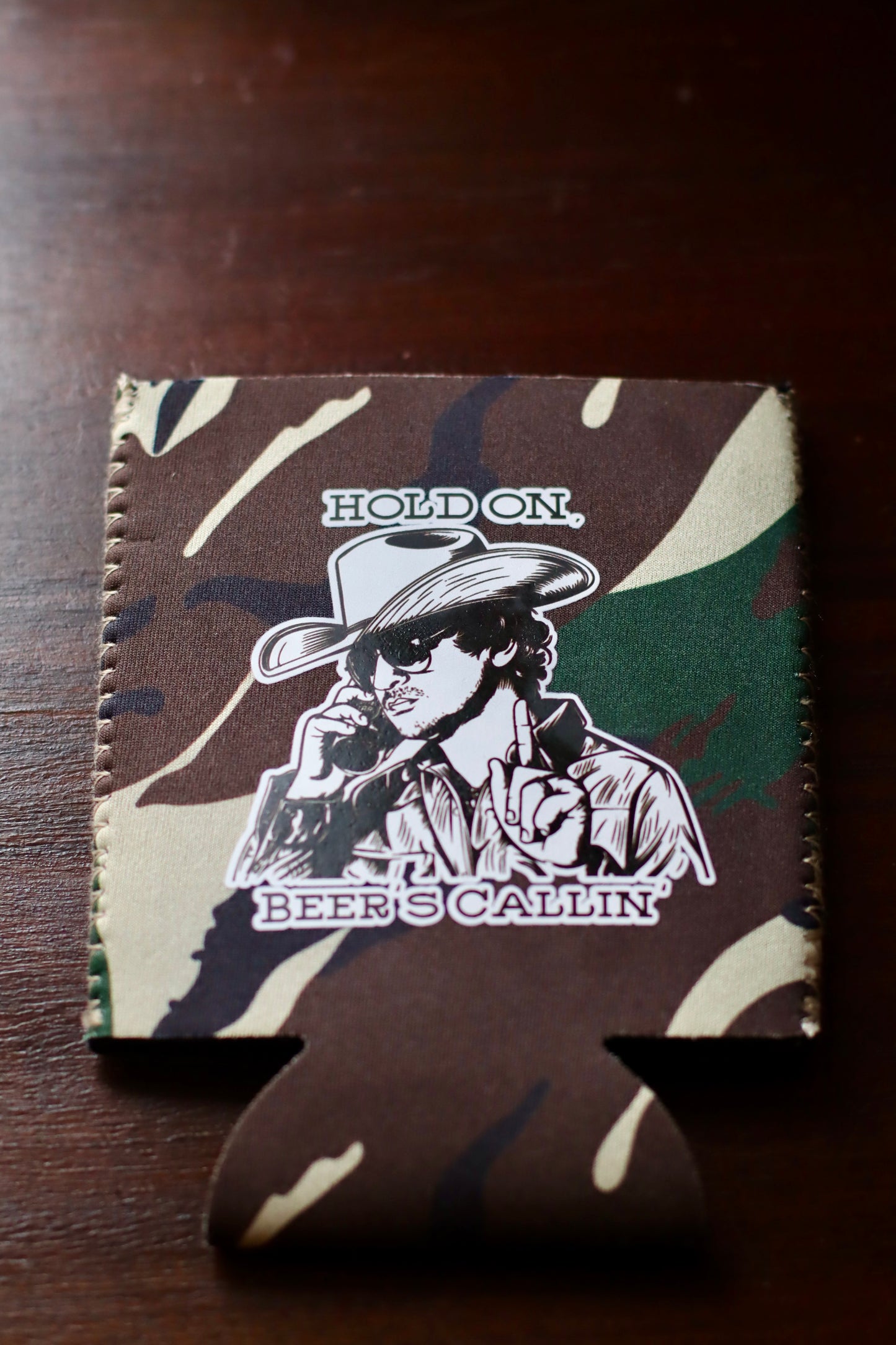 HOLD ON, BEER'S CALLIN' KOOZIE [+ STICKER]